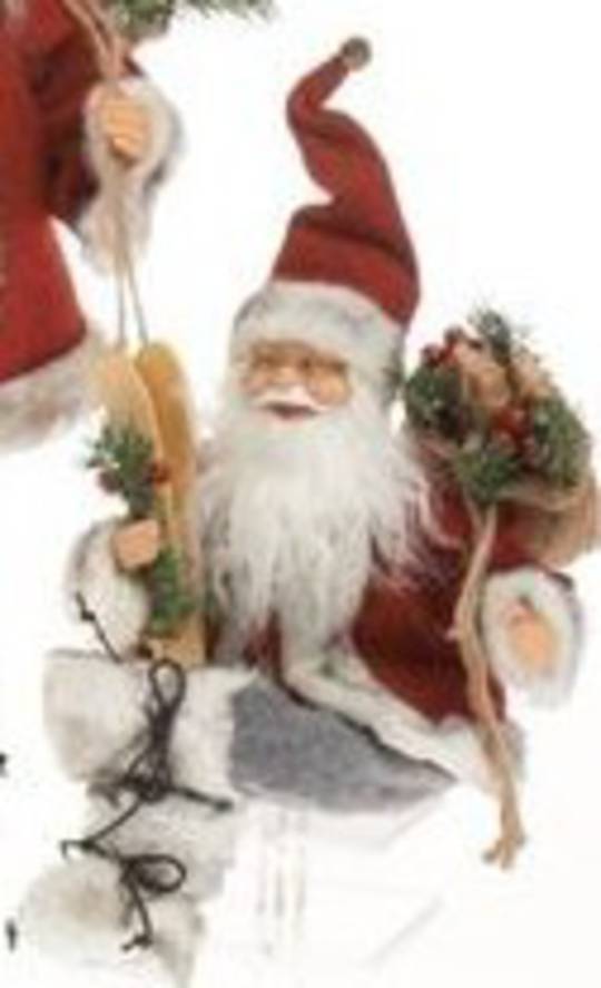 Sitting Santa Red Coat, Grey Trousers and Wooden Skis